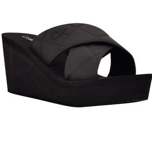 CALVIN KLEIN
Rhena Platform Slide Sandal